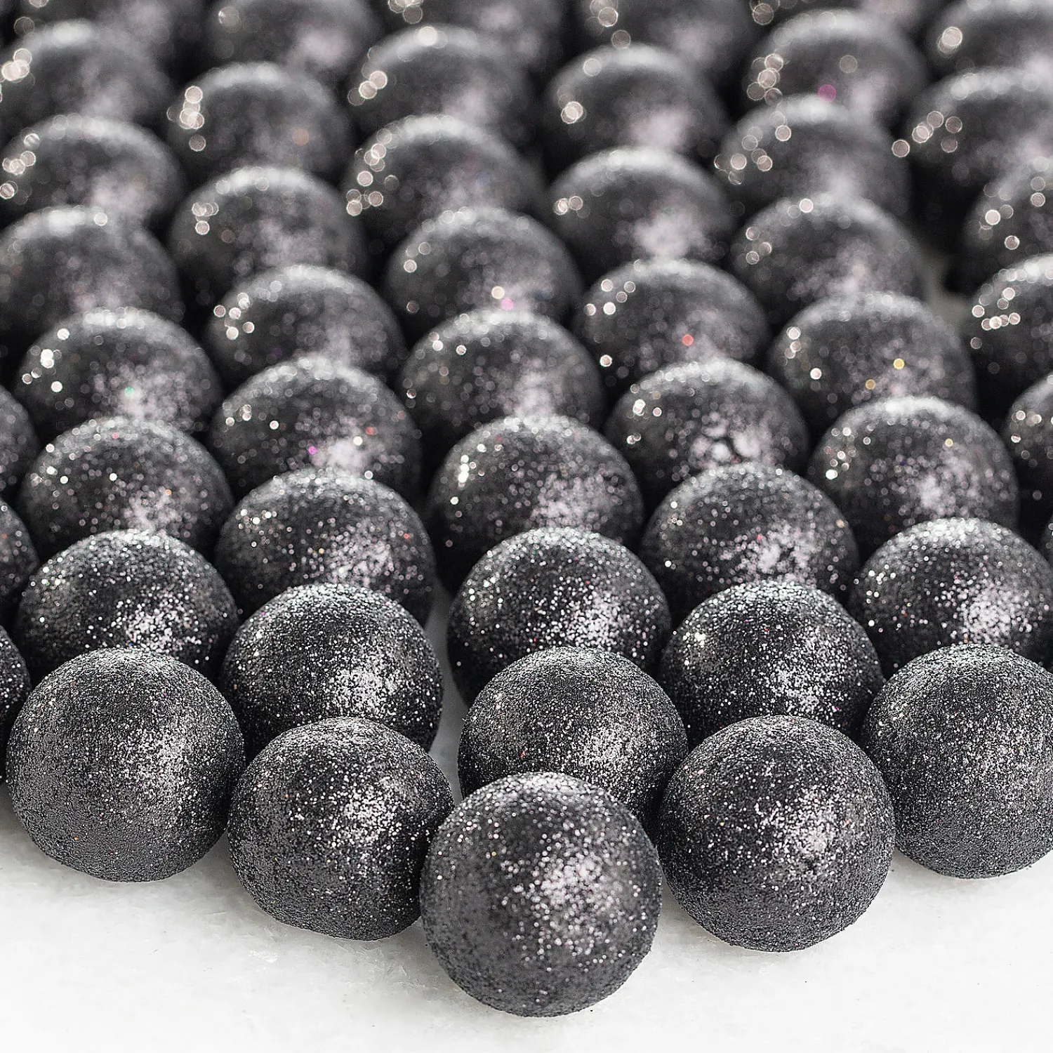 bulk__pc_black_glitter_ba_0.webp Bulk 120 Pc. Black Glitter Ball Vase Filler<Oriental Trading New