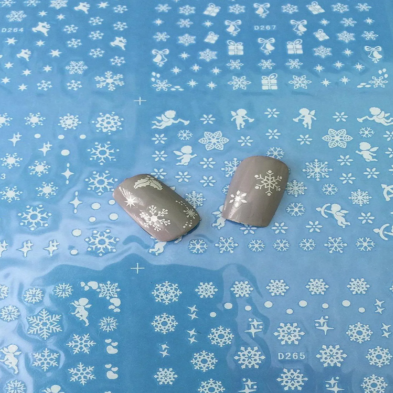 wrapables__snowflakes_wat_1.webp Oriental Trading Temporary Tattoos*Wrapables 500+ Snowflakes Water Slide Nail Art Nail Decals Snowflake Water Transfer Nail Decals
